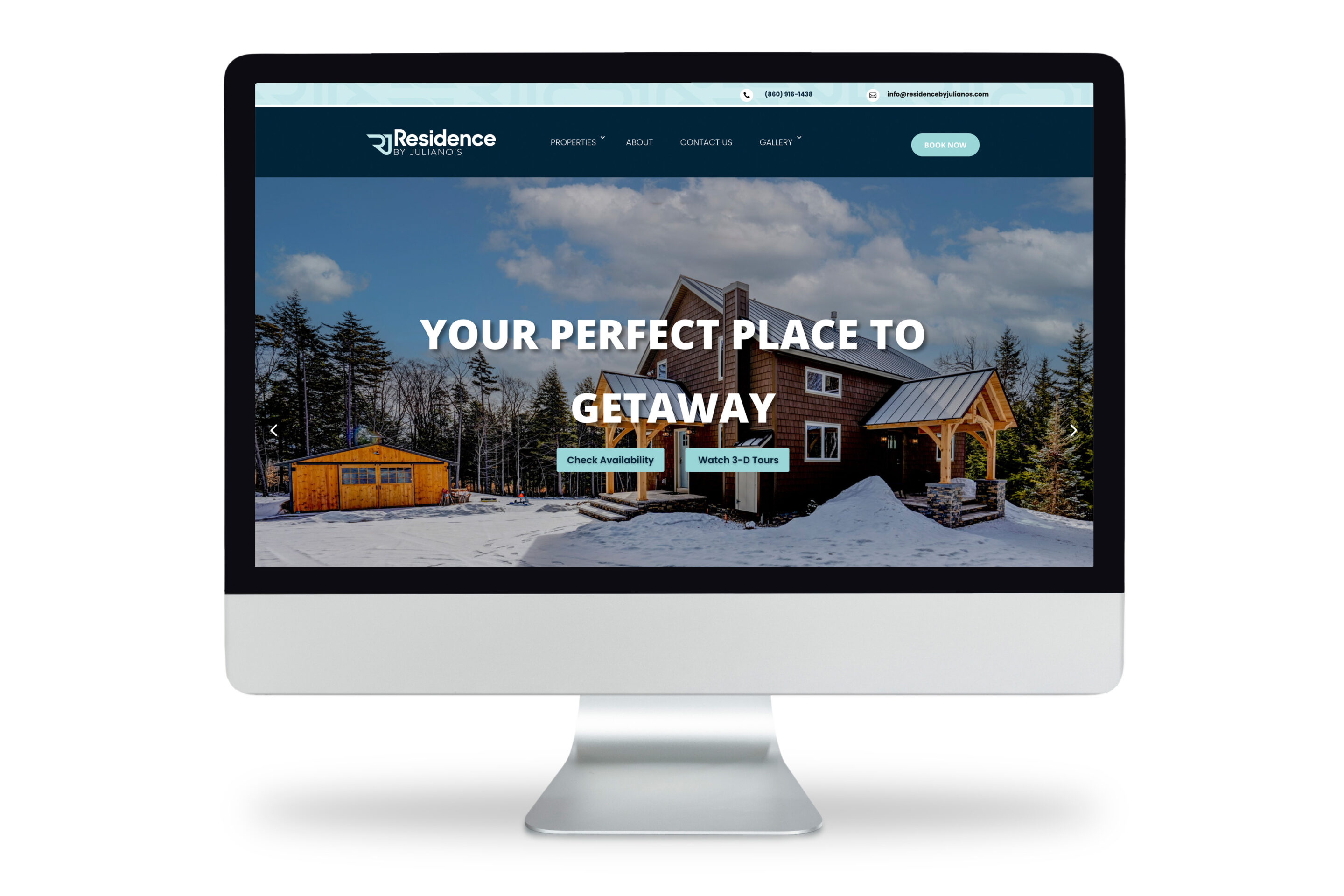 Residence-Desktop A computer monitor displays a website for Residence Getaway, showing a snowy cabin in the woods with the text Your Perfect Place to Getaway and buttons for checking availability and virtual tours.